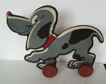 wooden snoopy figure