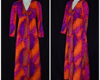 1960s long sleeve empire waist maxi dress in orange, pink, and purple
