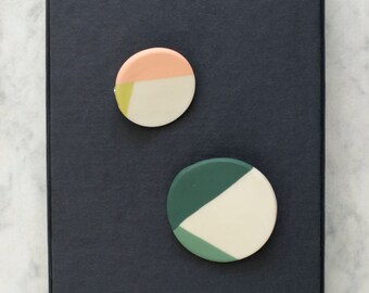 round porcelain brooch
