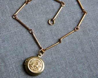Vintage Kruggerand locket charm bracelet,brass charm bracelet,locket bracelet, coin bracelet. Tiedupmemories