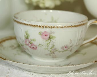 Haviland Limoges, France: White tea cup & saucer with light pink roses