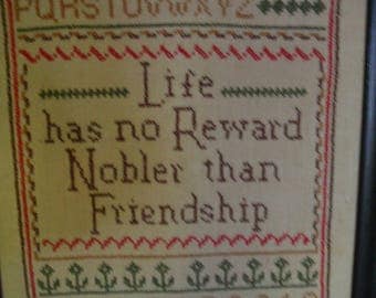 Vintage cross stitch sampler with friendship verse