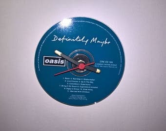 special original 1994 OASIS definitely maybe CD wall clock comes with original case and book signed to me by bonehead, mike and liam