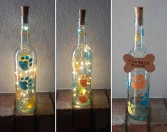 Wine bottle lights, Recycled wine bottle lamp with painted paws, Dog lover gift, Decor with dog prints, Free removable personalized bone
