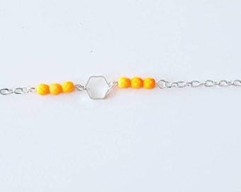Silvery bracelet pearl fluorescent orange