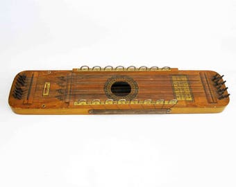 Vintage Ukelin. Ukulele, Violin Combination Musical Instrument. Circa 1920's.