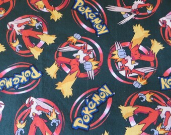 Pokemon Fabric Blaziken 2005 1 1/2 Yards by 44" Wide Dark Green with Blaziken Pokemon Novelty Fabric Childrens Fabric Bold Print Blaziken