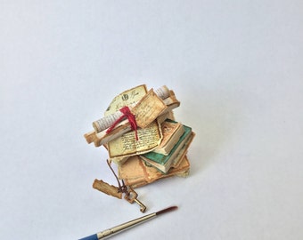 12th scale dollshouse book and papers stack with loose scrolls and rusted key *** Reserved ***