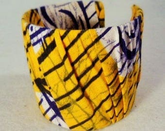 Semi rigid yellow and blue bracelet