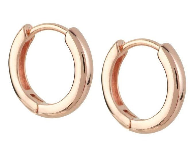 Sterling Silver wavy design clip Huggies earrings