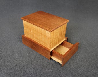 Keepsake box with hidden compartment