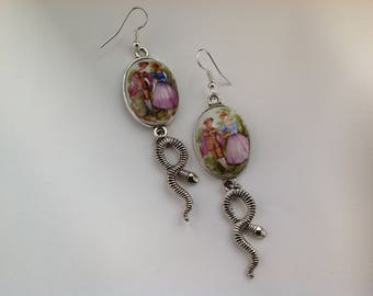 silver color, a dangle earrings