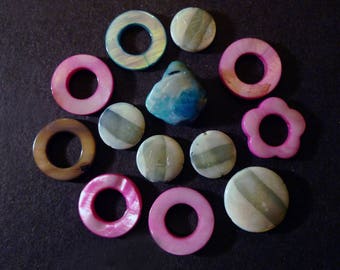 13 beads and spacers are in pink, blue mother of various shapes