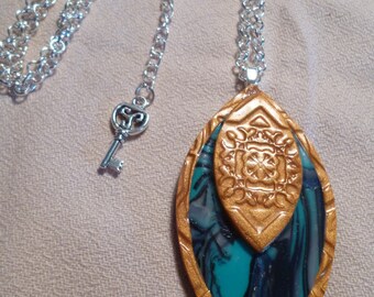 Necklace with polymer clay and silver chain.