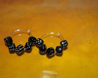 Pair of hoop earrings made of acrylic beads