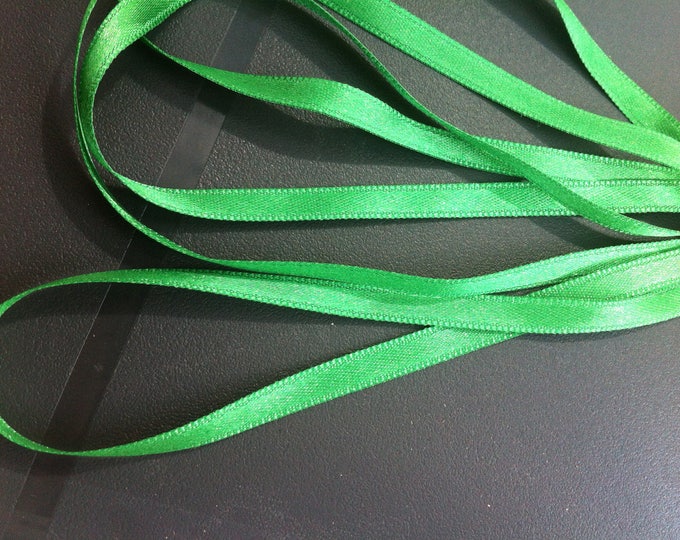 1 m of 6mm green colored satin ribbon