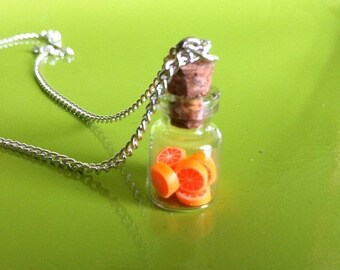 Orange vial pendant chain necklace