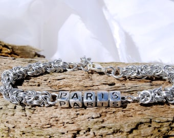 Personalised travel bracelet silver byzantine with silver lettering and clasp Lettering