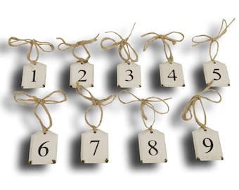 Set of nine metal numbers to hang
