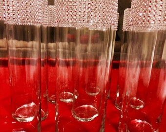 6 tall cylinder vases for 39 dollars. Each vase is beautifully decorated with silver rhinestone look mesh wrap