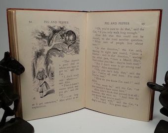 First Edition, thus Alice's Adventures in Wonderland by Lewis Carroll - Macmillan, 1922 Miniature Edition Hardcover Book