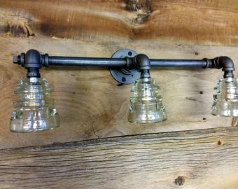 Triple glass insulator wall sconce, industrial lighting, steampunk lighting, vanity lighting