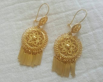 Golden filigree earrings. Oaxaca, Mexico