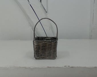 Silver metallic woven vintage basket