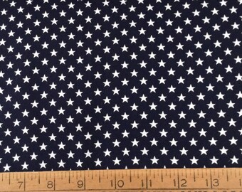 White stars on navy blue background cotton fabric by the yard