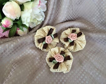 Set of three flowers in ivory lace and flowers pink