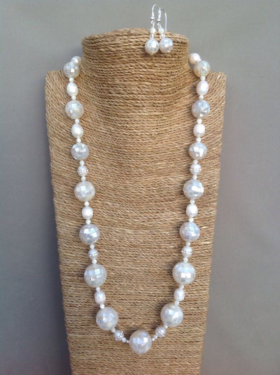 Pearl & mother of pearl neclace with matching silver earrings