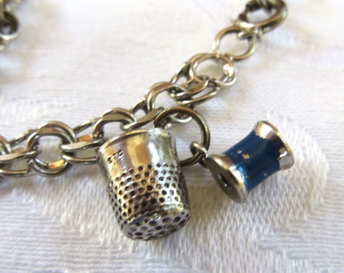 Sterling Silver Charm Bracelet, 7 Vintage Charms, Custom Bracelet, Bus, Cigarettes, Money Bag, Thimble, Thread, Telephone, Wreath