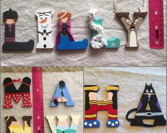 Disney Wooden Letters. Each letter is 3inches tall. Choose from Frozen, Beauty & Beast, Minnie, Winnie the Pooh Characters and more! (Girls)