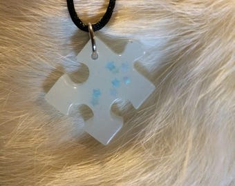 Glow in the dark puzzle piece necklace