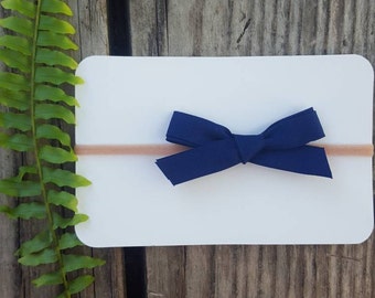Girls navy schoolgirl bow on nylon band, baby girl nylon headband, baby schoolgirl navy bow headband, schoolgirl navy bow