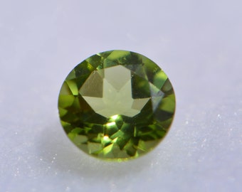 AAA Round Genuine Faceted Peridot ( 2mm- 7mm ). 811-011