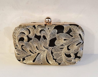 black embroidered clutch bag