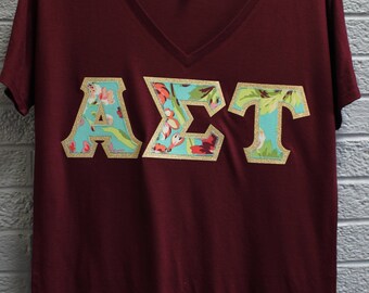 Alpha Sigma Tau Maroon Bella Flowy V-Neck With Amy Butler Bliss Bouquet on Gold Metallic (254C)
