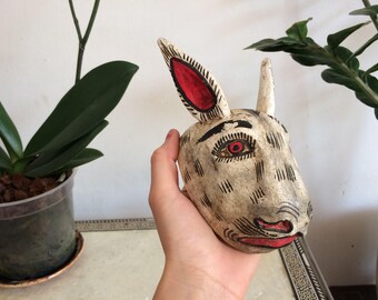 White rabbit wooden little mask. Wall decor.
