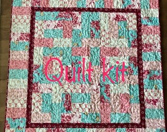 1 Blue and pink cowgirl baby quilt kit. Howdy by Stacy Iset Hsu for Moda fabrics. Cowboy boots and horseshoes. Baby quilt kit western baby