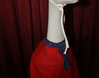 Red polka dot patterned lawn goose outfit with hat
