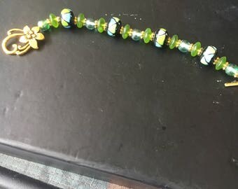 Beaded green and gold bracelet