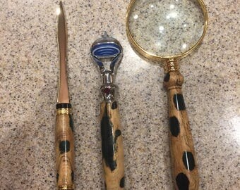 Magnifying glass letter opener and razor kit