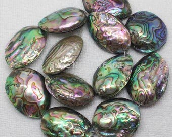 seashell beads sold per pair, between 20 and 30 mm