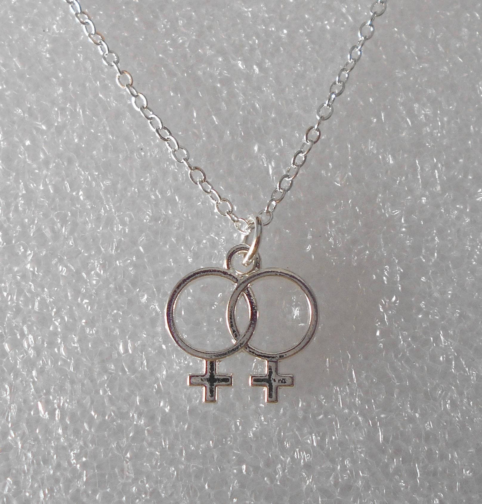 Silvertone double Venus symbol necklace lesbian woman