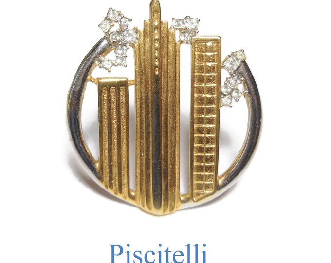 FREE SHIPPING Piscitelli skyline brooch, gold buildings with rhinestone accents in a silver circle, silver and gold tone gloss matte finish