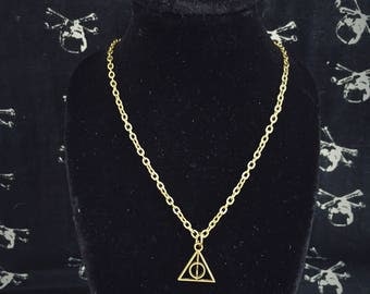 Super cute and dainty deathly hallows necklace in antique bronze