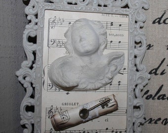 Distressed baroque frame and his Angel
