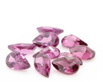 Pink Rhodolite Garnet. IF-VVS1. PEAR. (sold separately). Africa. 6 x 4 mm. SKU005414