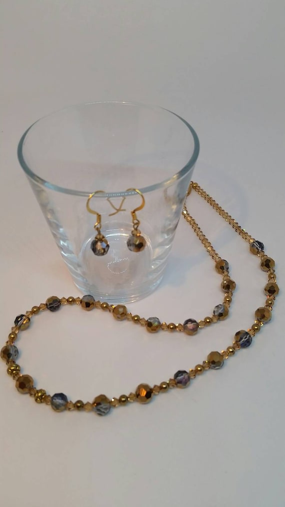 Items similar to Beautiful gold necklace and earring set. on Etsy